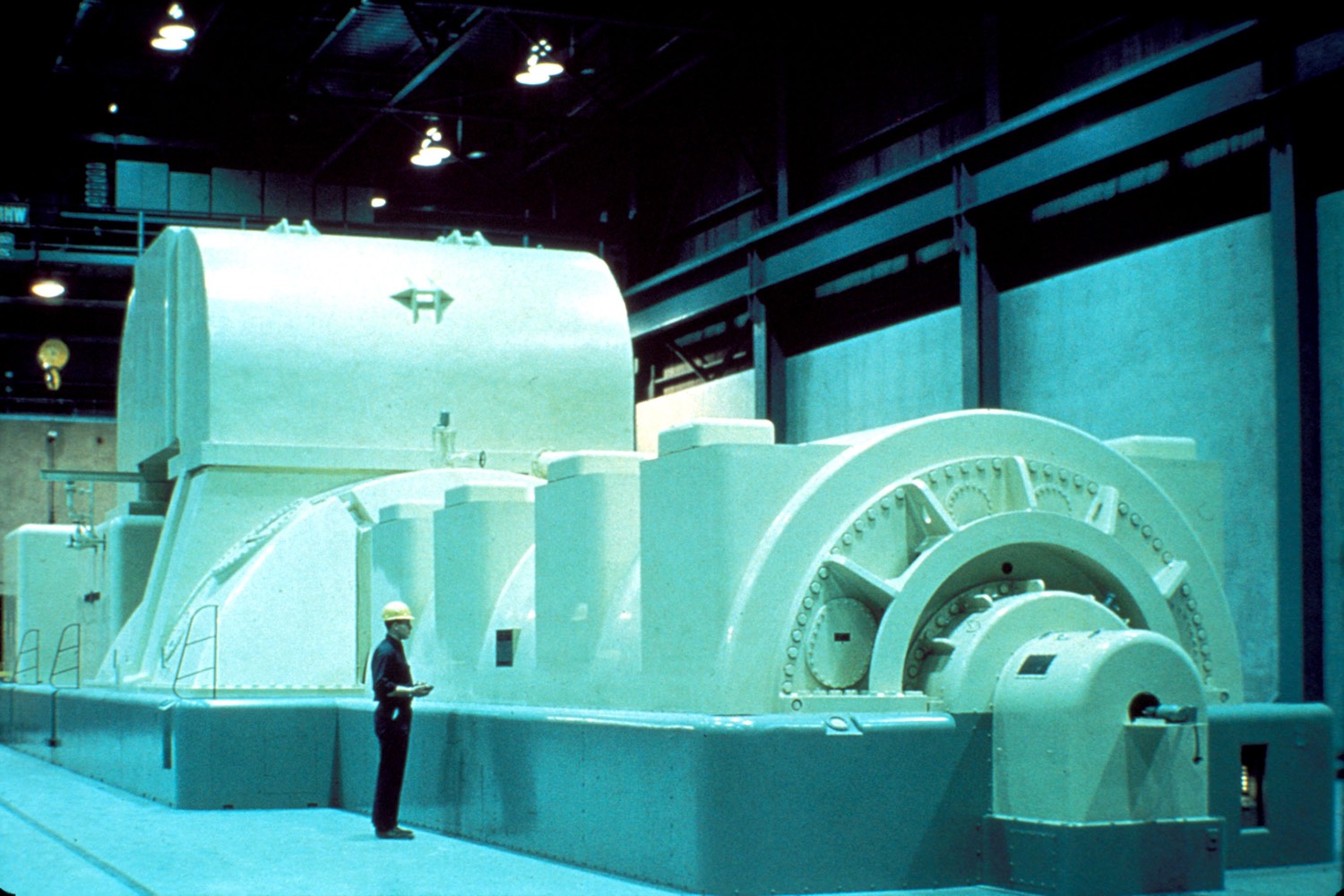 A steam turbine-generator in a turbine hall