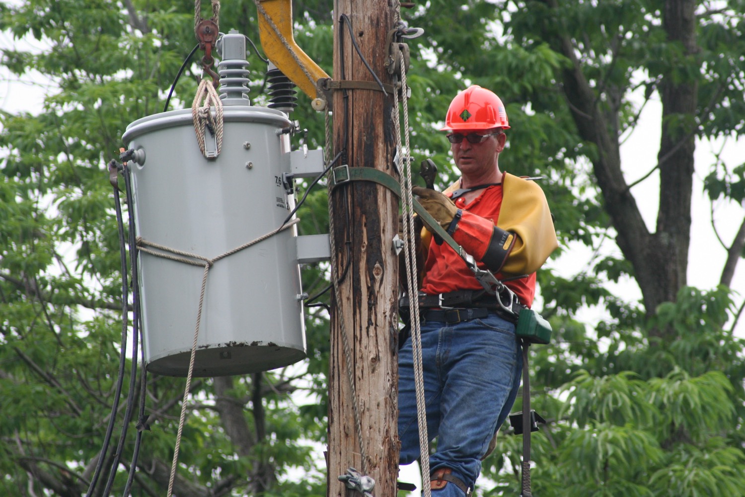 A contractor working safely at height