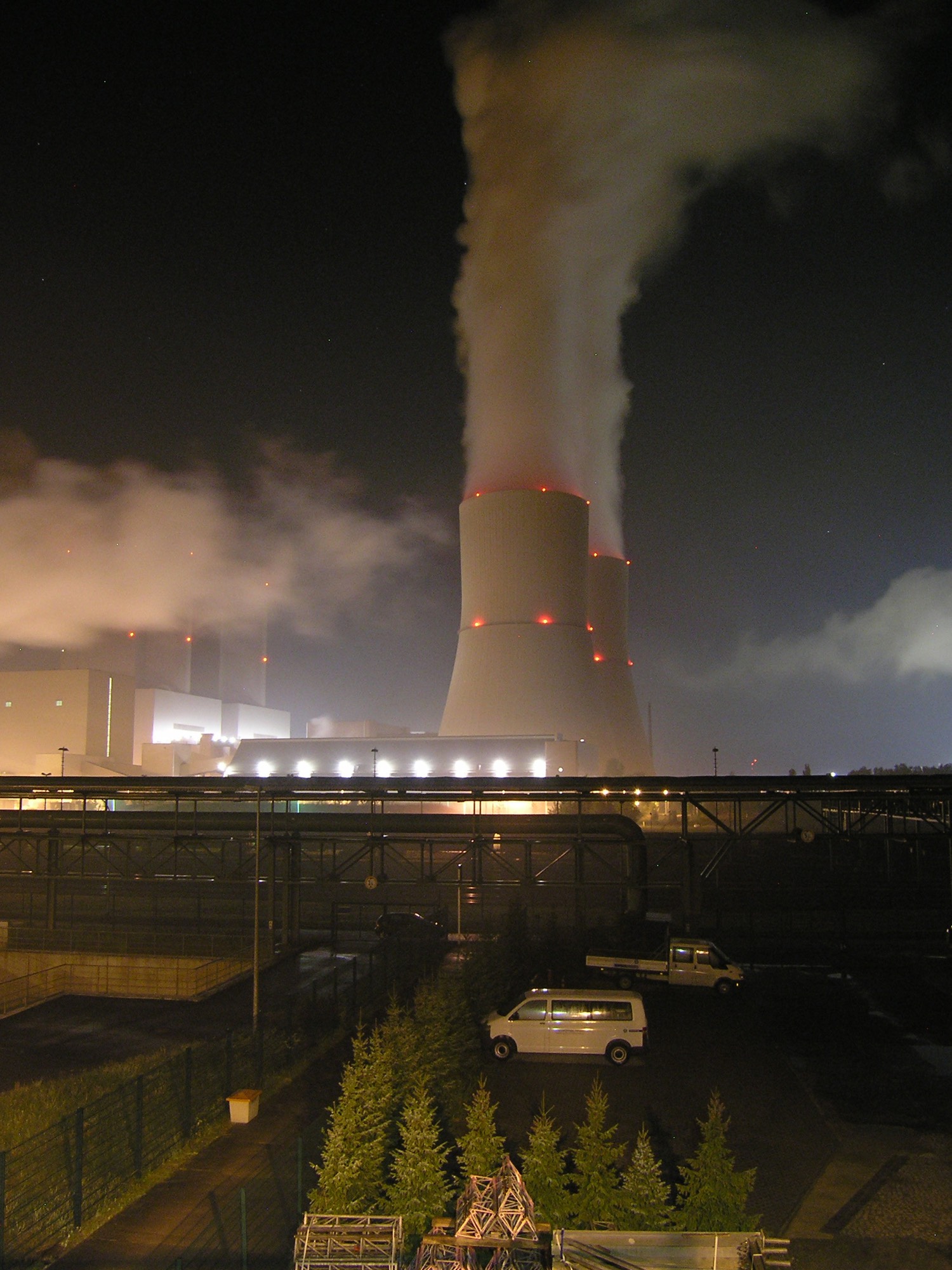 Cooling towers lit at night