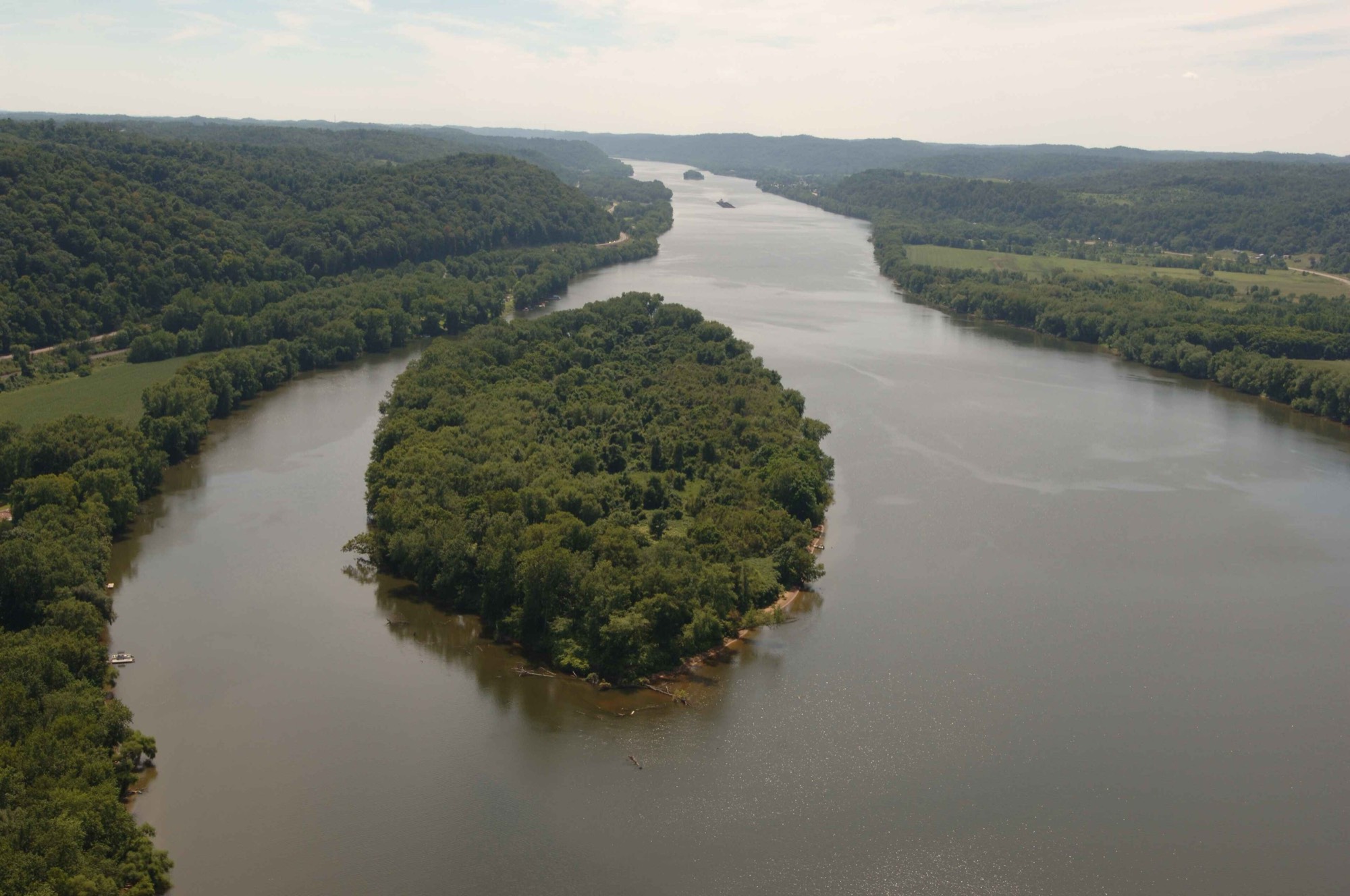 The Ohio River winding between forested islands
